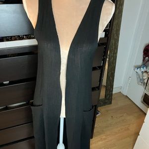 Woman’s long sweater